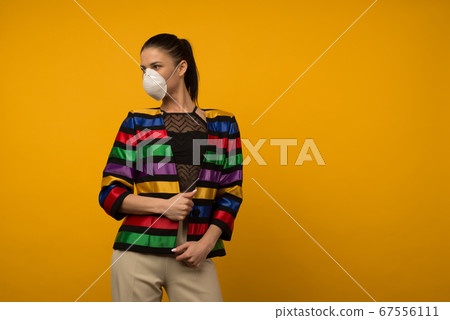 Beautiful slim girl fashion model posing in a 67556111