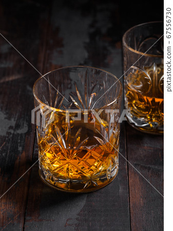Single malt scotch whiskey in crystal glasses  67556730