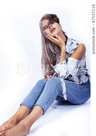 young pretty hipster girl posing emotional happy smiling on white background, lifestyle people concept young pretty hipster girl posing emotional happy smiling on white background, lifestyle people concept 67557118