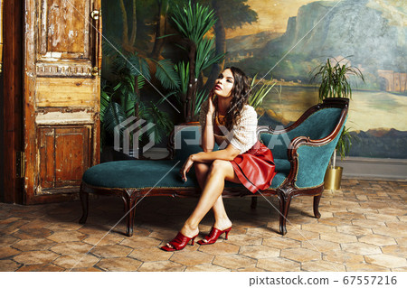 young pretty rich italian woman in golden luxury room interior, elegant styled hotel, people on vacation young pretty rich italian woman in golden luxury room interior, elegant styled hotel, people on vacation 67557216