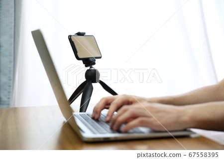 Telework laptop and smartphone Telework laptop and smartphone 67558395