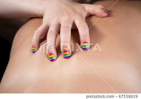 Photo of woman's hand during passion, close-up 67558619