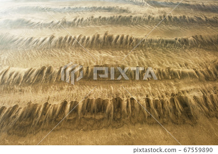 Sand of the seabed at high tide. 67559890