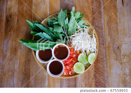Traditional Vietnamese food. Fresh herbs. Traditional Vietnamese food. Fresh herbs. 67559935