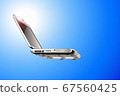 Laptop on blue 67560425