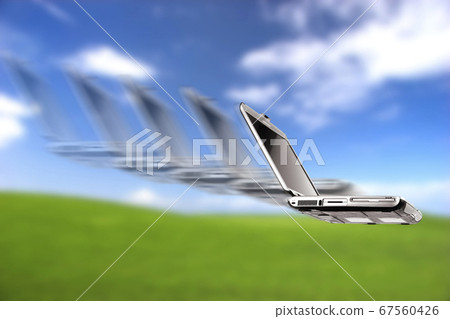 Laptop flying 67560426