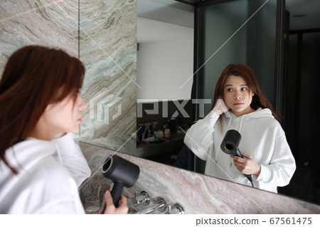 woman take care her hair woman take care her hair 67561475
