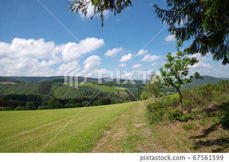 Sauerland region close to Winterberg with a small Sauerland region close to Winterberg with a small 67561599