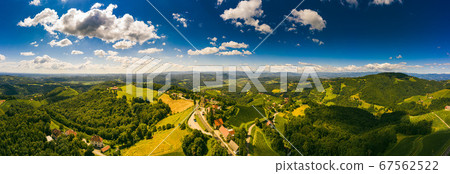 Aerial panorama of of green hills and vineyards Aerial panorama of of green hills and vineyards 67562522