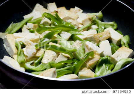 Fried island tofu and peppers Fried island tofu and peppers 67564920