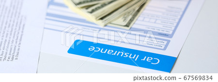 Insurance form lying on table Insurance form lying on table 67569834