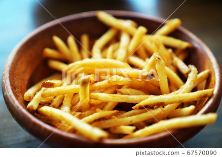 French fries on a plate 67570090