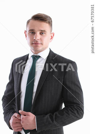 Handsome man in suit and tie look in camera 67570381
