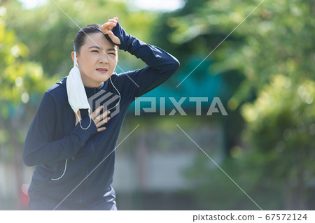 Portrait of Asian woman running at village park Portrait of Asian woman running at village park 67572124