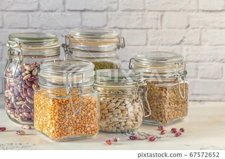 Glass jars with various legumes - beans, mung Glass jars with various legumes - beans, mung 67572652