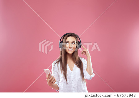Portrait of a happy young beautiful woman posing Portrait of a happy young beautiful woman posing 67573948
