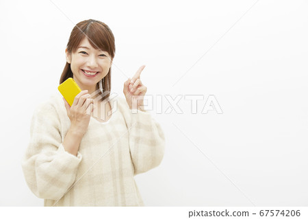 Female finger pointing Female finger pointing 67574206