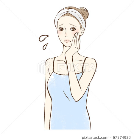 Anxious woman holding her hand on her cheek 67574923