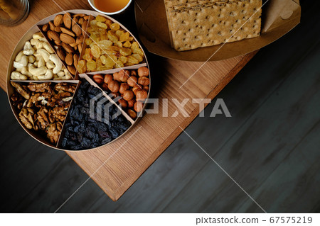 Set of healthy nuts in a bowl Set of healthy nuts in a bowl 67575219