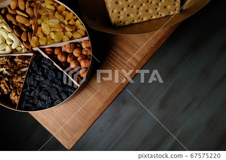 Set of healthy nuts in a bowl Set of healthy nuts in a bowl 67575220