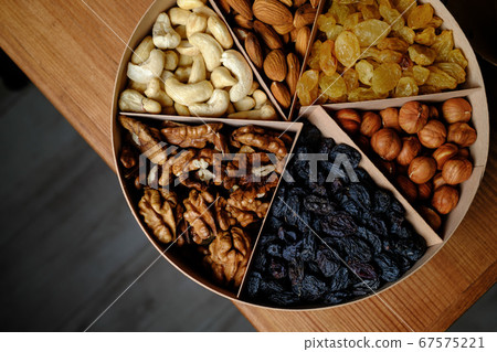 Set of healthy nuts in a bowl Set of healthy nuts in a bowl 67575221