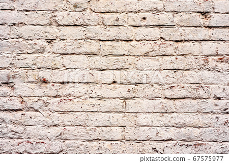 Texture of a brick wall with cracks and scratches Texture of a brick wall with cracks and scratches 67575977