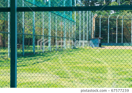 Baseball field seen over the net 67577239