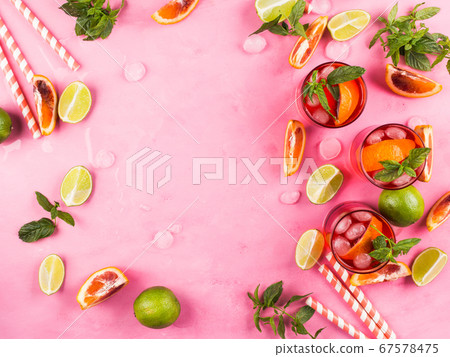 Fresh red cocktail with blood orange background 67578475