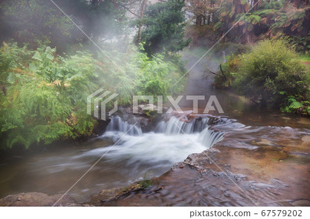 Hot waterfall 67579202