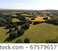 Aerial view to a meadow near Tonbrodge, Kent, UK. British aerial green view of the countryside. 67579657
