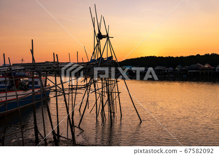 Bang Pat Fisherman village at sunset, Phang Nga Bang Pat Fisherman village at sunset, Phang Nga 67582092