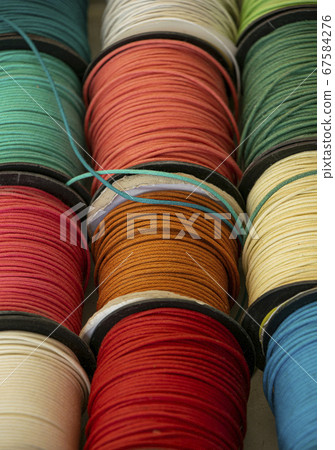 Colorful leather cover notebooks on retail display 67584276