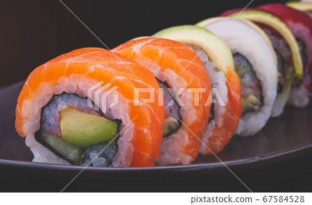 Mix sushi roll salmon and other fishes. Mix sushi roll salmon and other fishes. 67584528