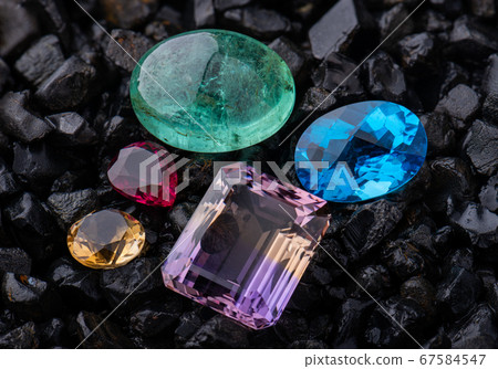 Emerald gemstone and blue quartz. Emerald gemstone and blue quartz. 67584547