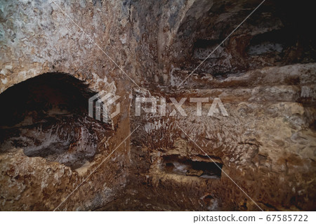 Ancient christian cemetery (catacombs) of Saint Paul. Famous historical landmark in Rabat, Malta. 67585722