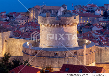 Aerial view of Dubrovnik and the Minchet Tower at sunset. Aerial view of Dubrovnik and the Minchet Tower at sunset. 67586572