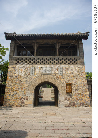 Historical asian temple with chinese ieroglifs on it 67586637