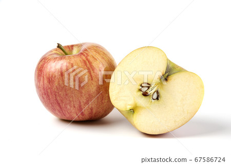 Whole and sliced red apples on white Whole and sliced red apples on white 67586724