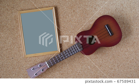 Photo material that can be inset composite Ukulele and photo frame 67589431
