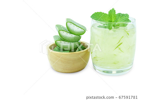 Aloe Vera for drinking on wood table isolated Aloe Vera for drinking on wood table isolated 67591781