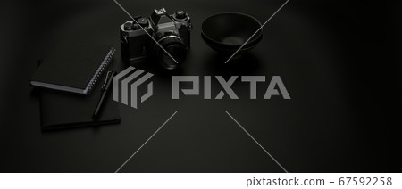 Dark worktable with copy space, camera, schedule Dark worktable with copy space, camera, schedule 67592258