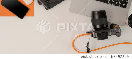 Modern workspace with camera, laptop, notebooks, Modern workspace with camera, laptop, notebooks, 67592259
