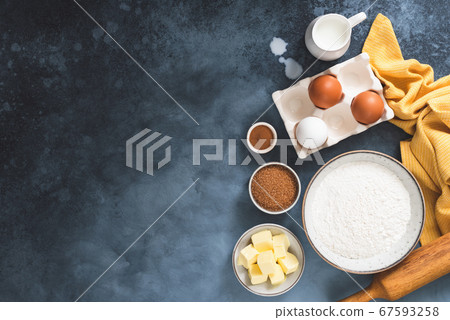 Baking ingredients on a blue background 67593258