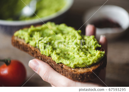Toast with mashed avocado Toast with mashed avocado 67593295