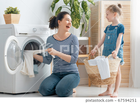 family doing laundry family doing laundry 67594251