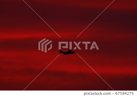 C-130 Hercules flying in the dusk C-130 Hercules flying in the dusk 67594275