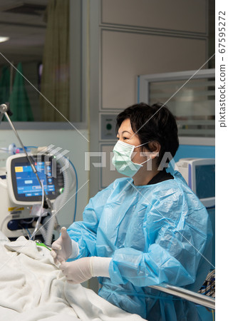 Doctor medical care patient on bed in hospital 67595272