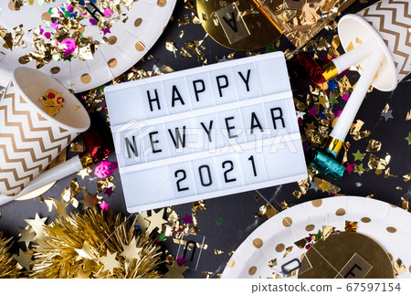 Happy new year 2021 on light box with party 67597154
