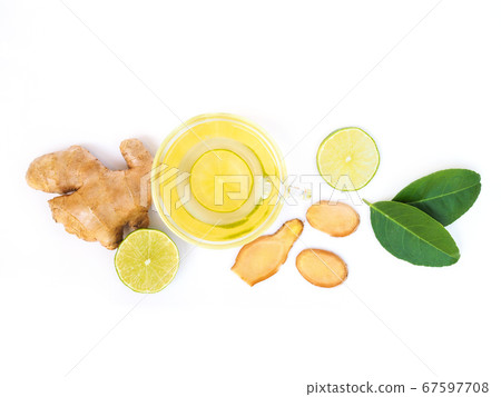 Healthy herbal drink in mug or tea with lemon and ginger 67597708