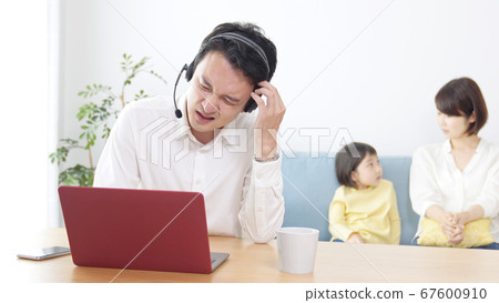 Teleworking man and family video conference remote work Teleworking man and family video conference remote work 67600910